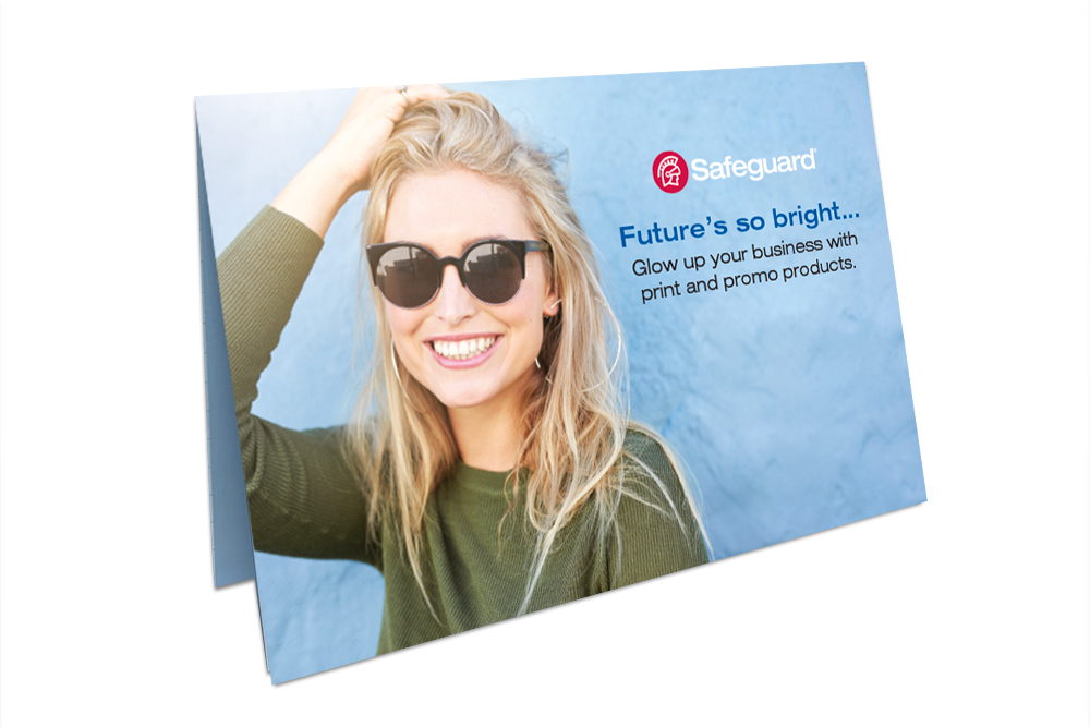 Front panel of direct mail print piece with smiling young woman wearing sunglasses and the text Future's so bright... Glow up your business with print and promo products.
